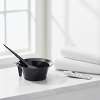 Black Hair Dye Brush And Bowl Set on White Marble Bathroom Shelf with Natural Window Light