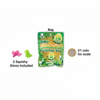 Flat lay of Dino Squishies Surprise Bag with lime green and pink squishy dinosaurs beside a £1 coin showing product scale on white background