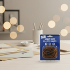 Just Stationery heavy duty elastic bands 60g pack on a styled office desk