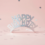 Silver prismatic birthday tiara on headband with sparkling crystals against elegant background