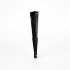 Black lace hand fan fully closed and folded showing slim elegant profile