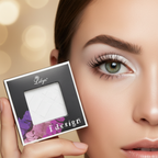 Close-up of snow white shimmer eyeshadow look with Lilyz compact held beside eye