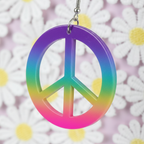 Extreme close-up macro detail of rainbow gradient peace sign earrings showing smooth acrylic finish and colour transition