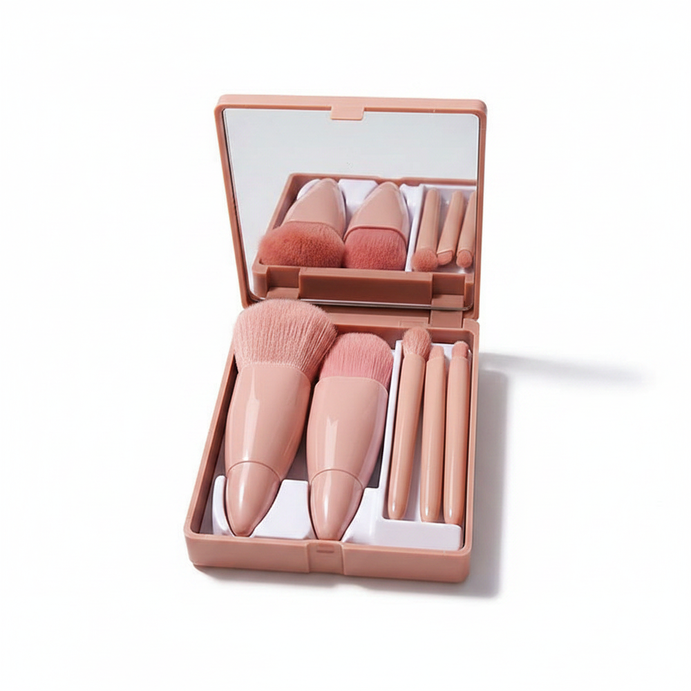 Portable 5-piece beige makeup brush set with mirror compact, open showing all brushes on white background