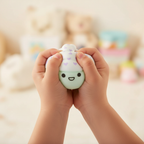 Child squeezing kawaii squishy cupcake toy - lifestyle interaction shot