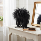 Black 80s rockstar wig displayed on vanity dressing table with natural window light