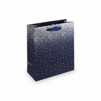 Navy ombre medium gift bag with metallic silver dot pattern and navy cord handles on white studio background