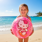 Young girl holding Hello Kitty pink beach ball at the beach smiling with summer happiness