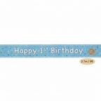 Blue glitz 1st birthday banner flat lay with £1 coin for scale