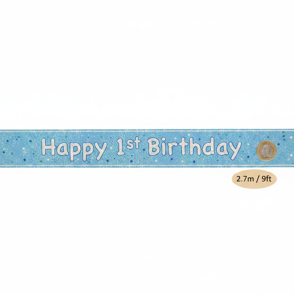 Blue glitz 1st birthday banner flat lay with £1 coin for scale