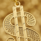 Extreme macro close-up of gold dollar sign medallion showing intricate embossed rope-pattern texture and metallic finish