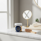 La Riche Directions Midnight Blue hair dye tub on a stylish bathroom vanity with natural window light