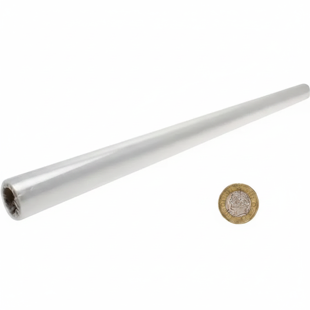 Clear cellophane wrap roll beside £1 coin showing scale and 75cm width size comparison