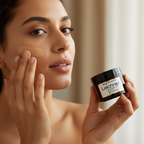 Woman applying Leichner Camera Clear Tinted Foundation Blend of Biscuit with fingertips, candid beauty moment