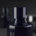 Extreme macro close-up of Wild Action Elixir EDT bottle cap and neck, high-gloss navy-black lacquer finish and silver chrome lettering detail