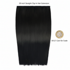 20 inch Black Magic clip-in hair extension flat lay beside a £1 coin showing scale on white background