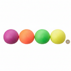 Four neon squishy balls in assorted colours laid flat beside a UK £1 coin to show size on a white background