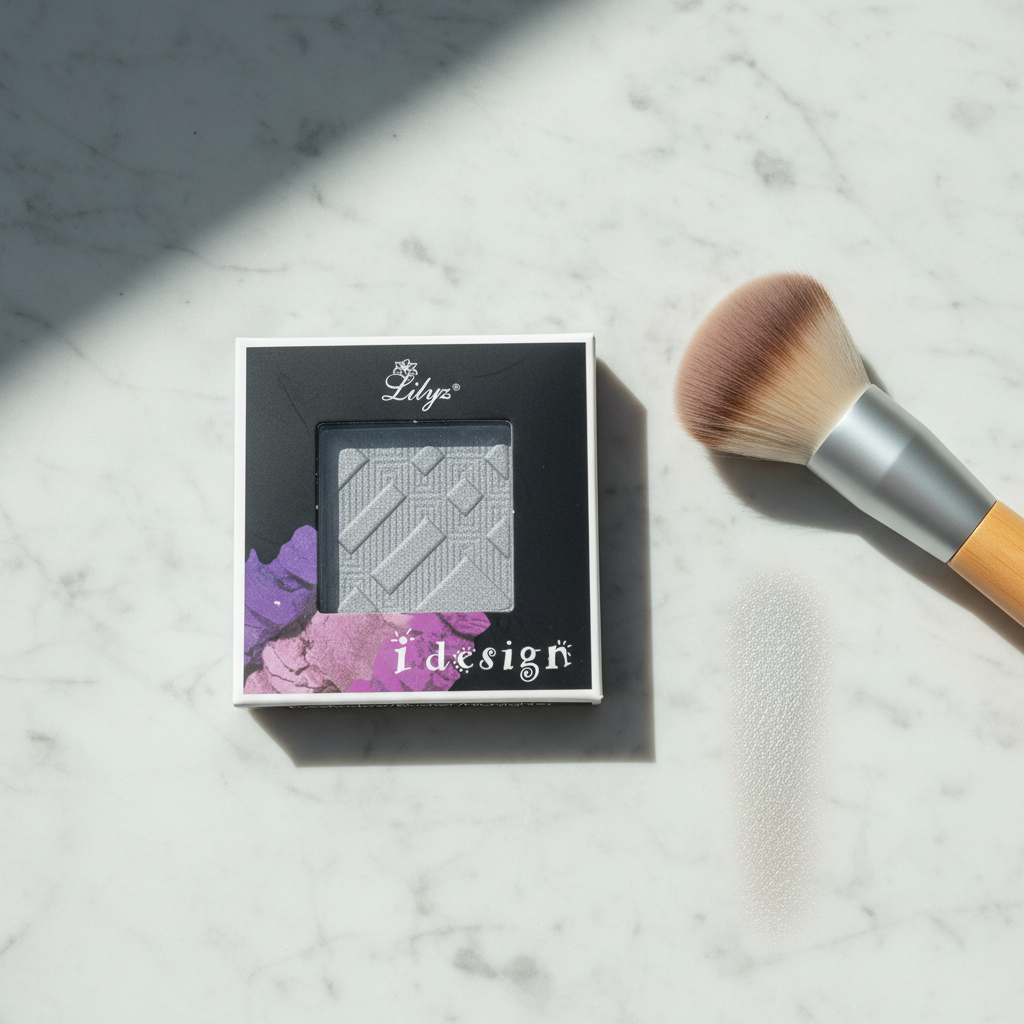 Lilyz Eyeshadow Mono Misty Silver on marble surface with makeup brush and shimmer swatch
