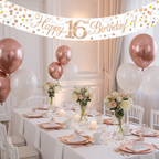 Elegant 16th birthday party setup with white and rose gold Sparkling Fizz banner above decorated table