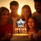 Silver foil birthday candle glowing on a birthday cake surrounded by joyful family celebration in warm golden light