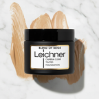 Leichner Camera Clear Foundation Blend Of Beige jar on white marble surface - professional product shot