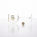 Art Deco 40th Birthday Gin Glass placed beside a pound coin on white background to show scale and size, professional flat lay