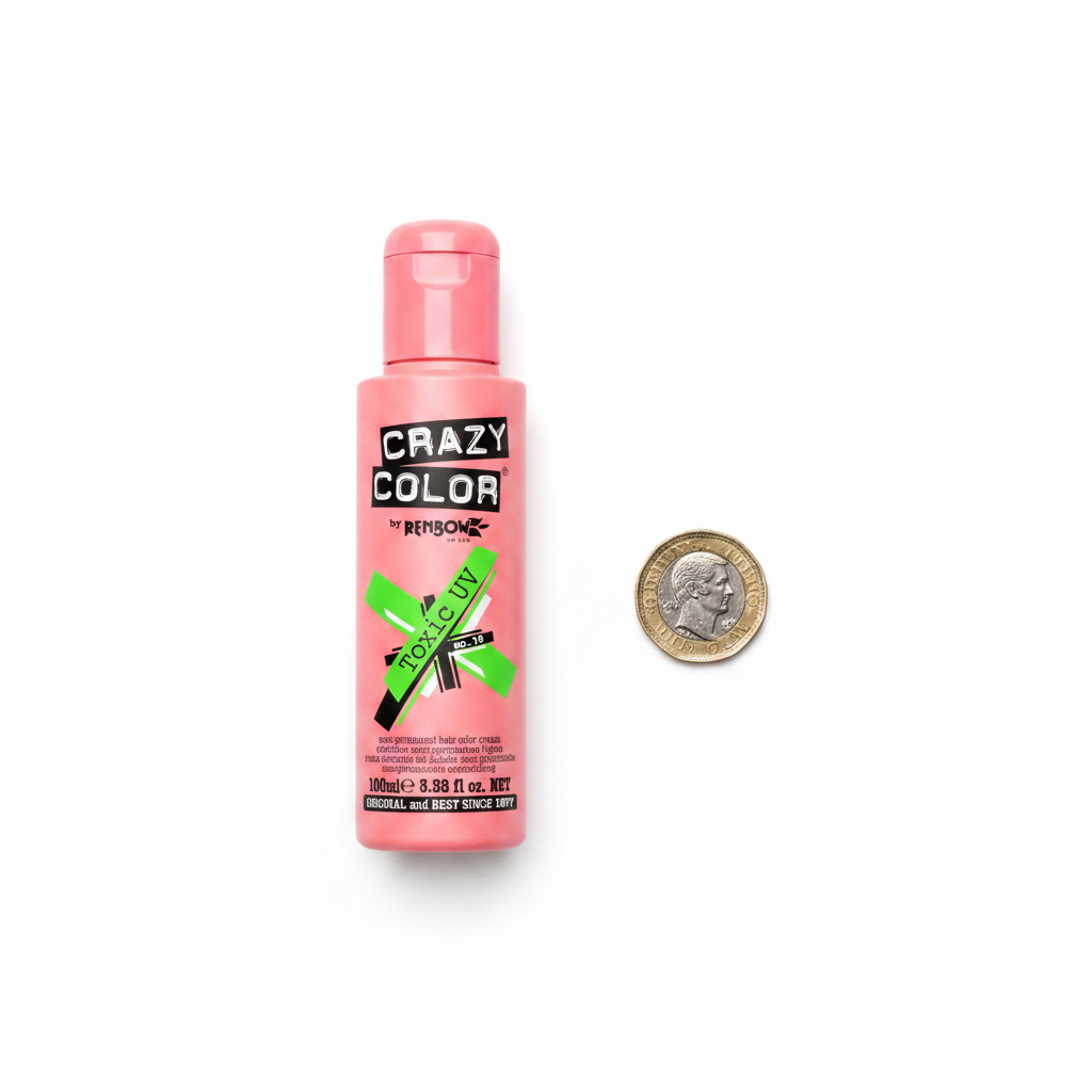Crazy Color Toxic UV Green Hair Dye 100ml flat lay beside a British pound coin to show scale, white background