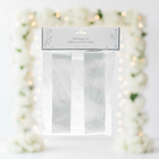 White wedding car ribbon and pull bows pack of 3 on a soft romantic white floral background