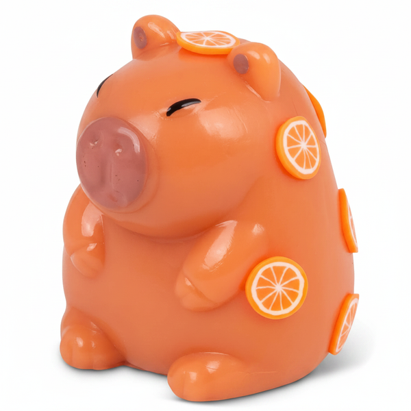 Scrunchems Sticky Squishy Capybara toy on white background — terracotta orange squishy figure with orange citrus slice decorations