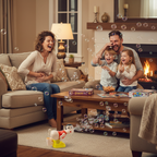 Family laughing together at Funny Boy Bubble Farting Machine in living room - lifestyle image
