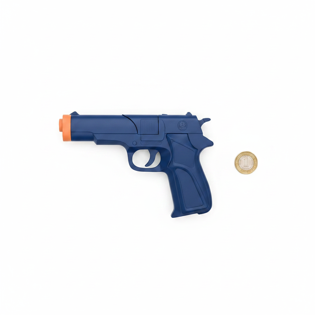 HTI Swat Mission navy blue cap revolver toy gun flat lay on white background with pound coin for scale