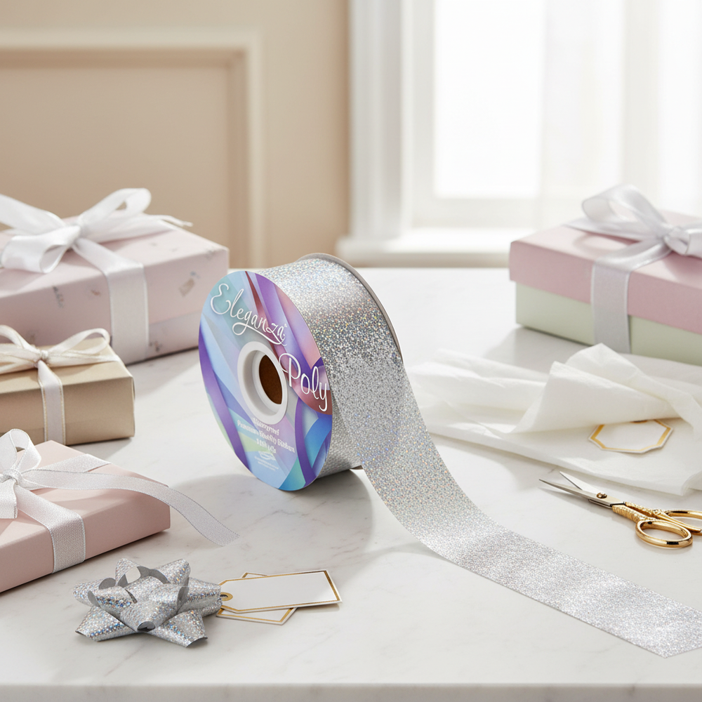 Holographic silver ribbon on elegant gift wrapping station with luxury presents and marble surface