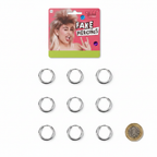 Fake Piercings Set 8-Pack flat lay showing all 8 silver chrome clip-on hoop rings individually arranged on white background with a £1 coin for scale and hot pink blister card packaging