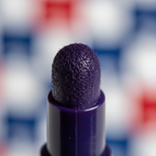 Extreme macro close-up of Anker Stationery Bingo Marker felt dabber tip in deep navy-purple showing texture and ink quality