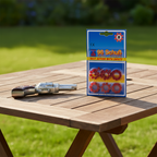 Sohni-Wicke cap gun rings pack on a rustic garden table with toy cap gun, natural sunlight lifestyle photography