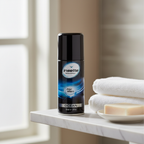 Insette Mens Body Spray Ocean 150ml on a marble bathroom shelf with white towel and soap in natural window light