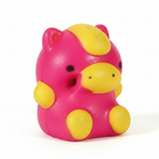 Extreme macro close-up of pink squishy bear toy showing smooth slow-rise foam texture and material quality