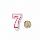 White plain number 7 birthday candle with hot pink glitter border beside a £1 coin on white background showing size scale