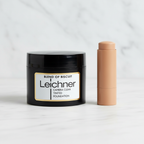 Leichner Camera Clear Foundation Blend Of Biscuit on white marble surface - professional product shot