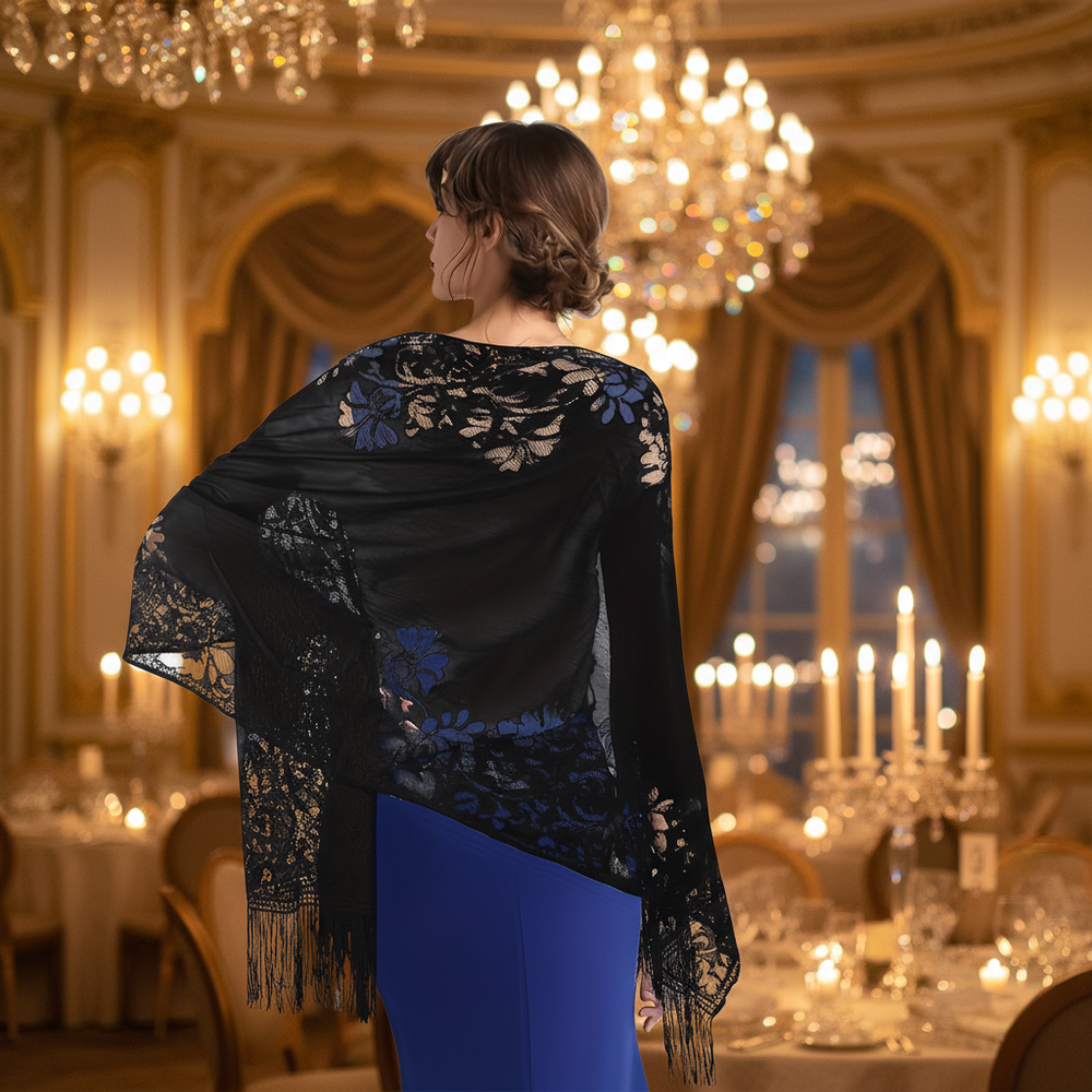 Woman wearing black lace pashmina shawl at an elegant evening gala event