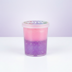 Glitter crystal putty in clear tub showing sparkling two-layer iridescent effect