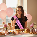 Bride-to-be wearing pink hen party sash at a hen party brunch in golden hour light