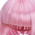 Close-up macro detail of baby pink synthetic bob wig fibres