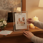 Silver Age 60 milestone photo frame displayed on a stylish mantelpiece with candles and birthday flowers