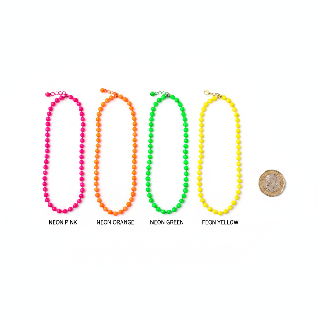 Flat lay of all 4 neon bead necklaces in pink, orange, green and yellow with £1 coin for scale reference