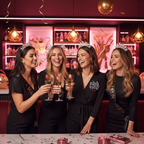 Group of women celebrating at a hen party, bride wearing Big Badge Bride To Be pin badge
