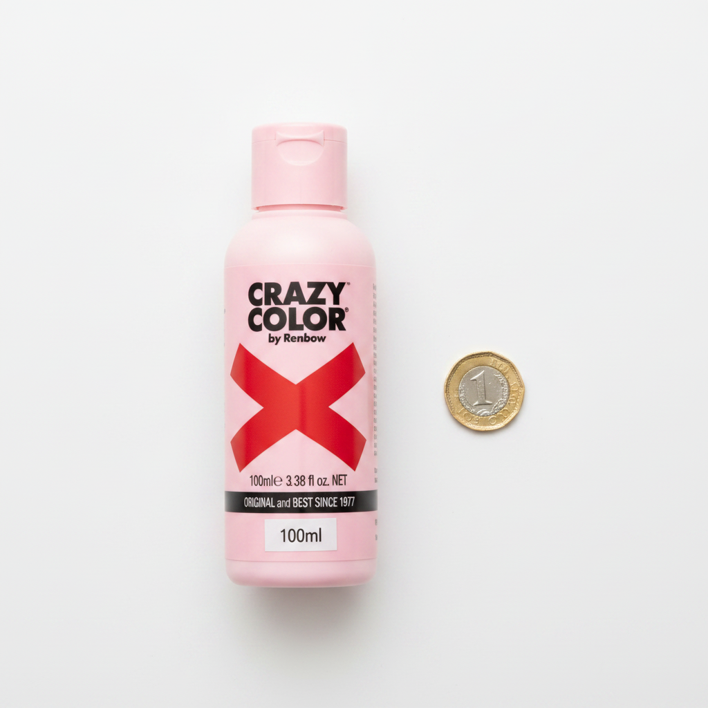 Crazy Color Vermillion Red 100ml hair dye bottle beside a £1 coin on white background showing product size