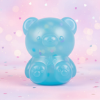 Scrunchems Kind Heart Squish Bear product shot on pastel pink background with hearts and confetti