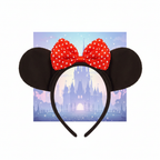 Mouse ears headband with red bow on magical Disney-themed background - product shot