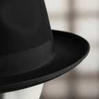 Extreme macro close-up of black fedora hat fabric texture and grosgrain ribbon band detail